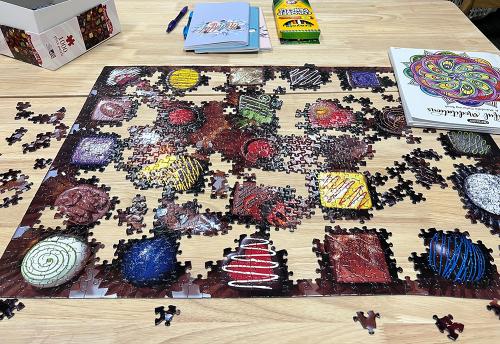 a photo of a puzzle in the wellness room