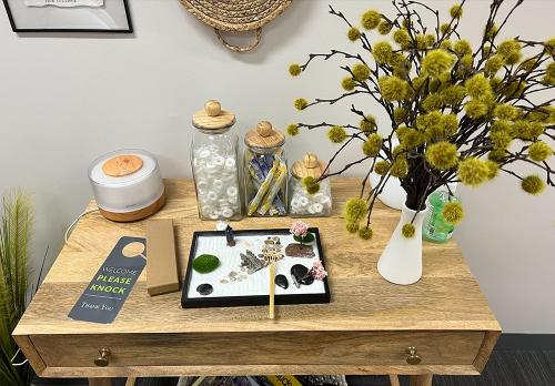 a photo of the Zen garden in the wellness room