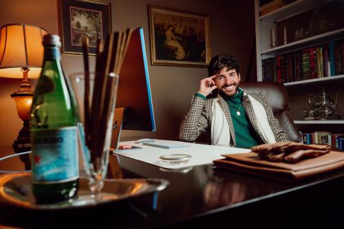 a photo of brandon bethel at a desk