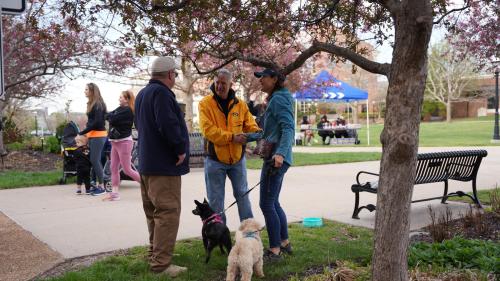 dean bailey speaking with race attendees